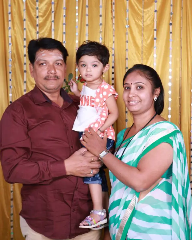 A family photographed with their child at Shobha Nursing Home (2 of 8)